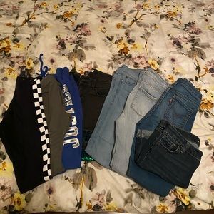 Lot of 8 jeans and leggings sizes 10/12 and 14!
